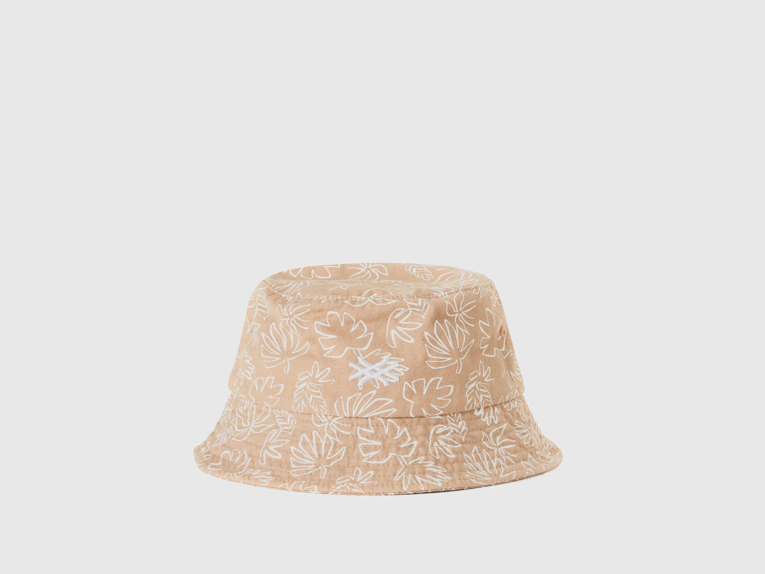 BEIGE HAT WITH LEAF PRINT